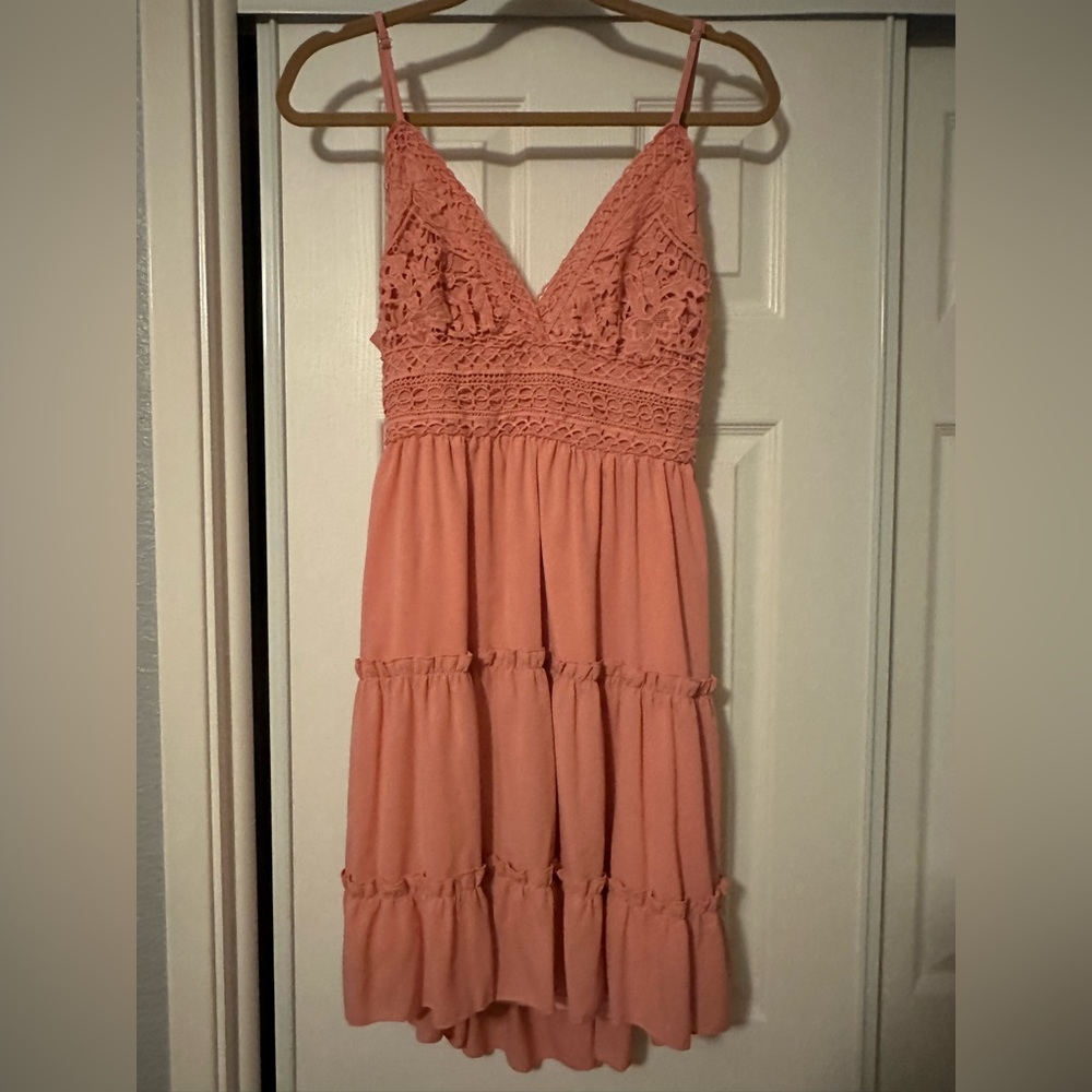 This is a boho style dress worn twice size L